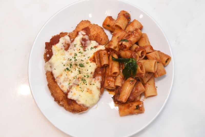 Chicken Parmesan - Chicken Breast seasoned, breaded and served with our Special Tomato Sauce, Melted Mozzarella and Rigatoni