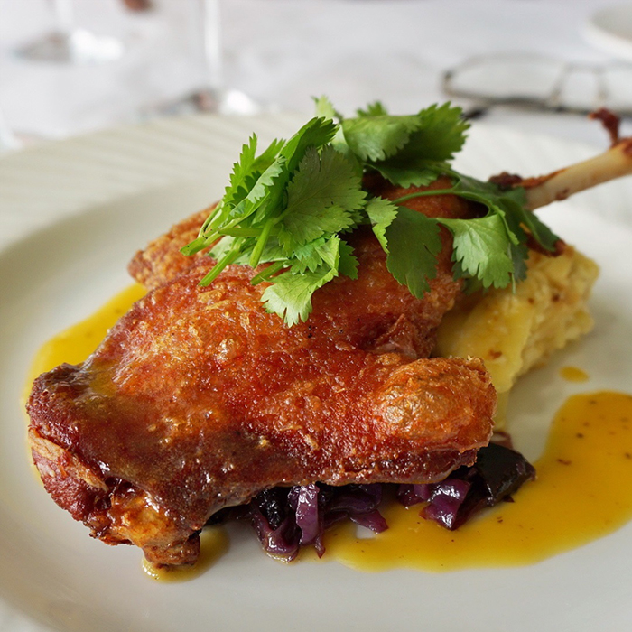 Duck-Leg-Confit---with-orange-Grand-Marnier-Beurre-Blanc,-and-gratin-potato.-nielgq