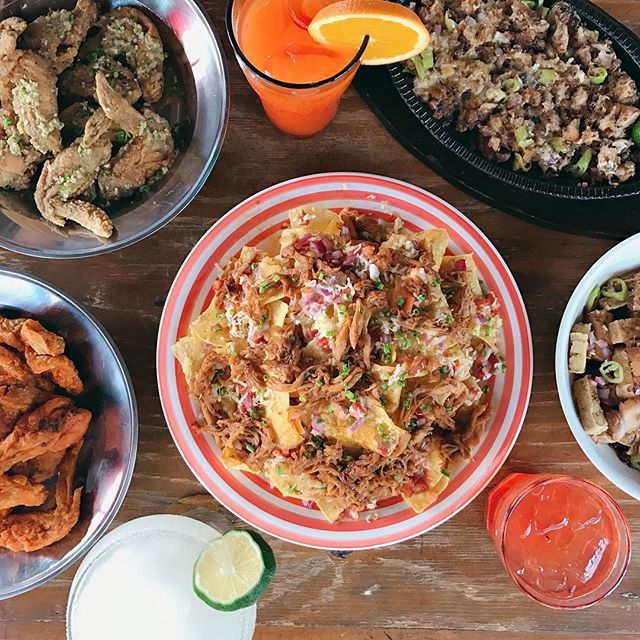 Skybox Sports Bar's Nachos, Chicken Wings, Sisig, and variety of drinks