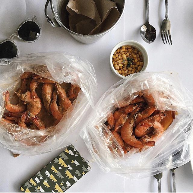 Shrimp Bucket's Shrimps with a side dish of corn kernels