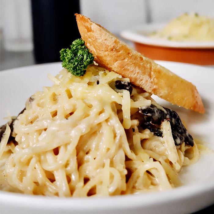 LoLa Cafe+Bar â Tomas Morato Carbonara with Garlic Bread