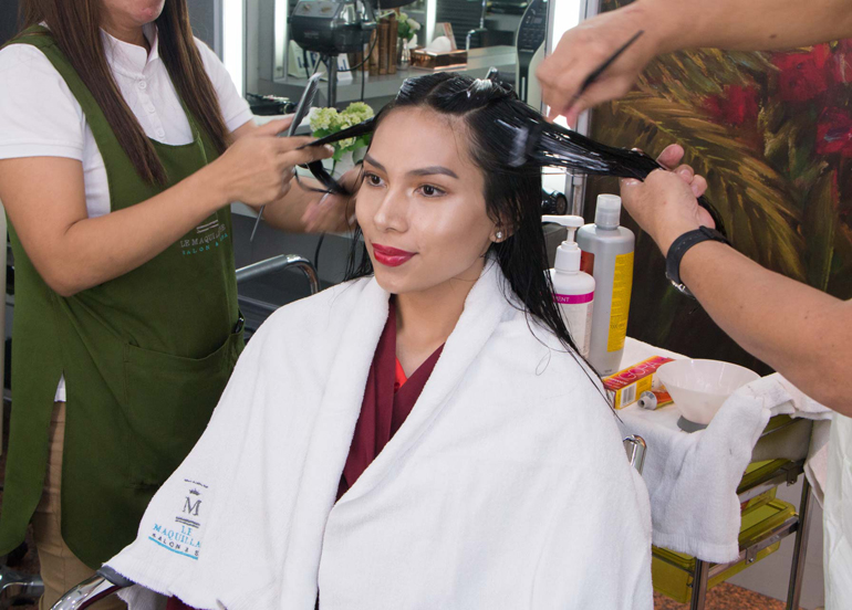 Le Maquillage client having a hair treatment done