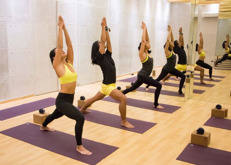 yoga-class-stretching-upwards