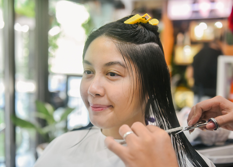 The Color Bar client getting a haircut