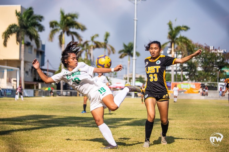 two-girls-playing-football