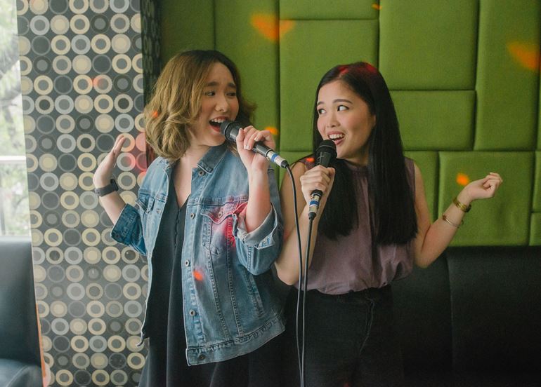 two-girls-singing-ktv