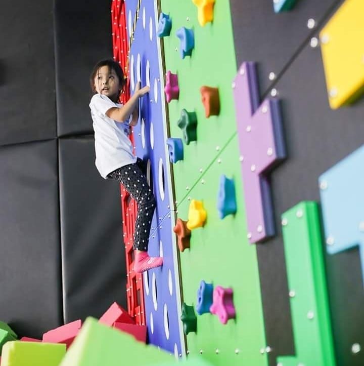 Bounce Philippines Trampoline Park Girl wall climbing