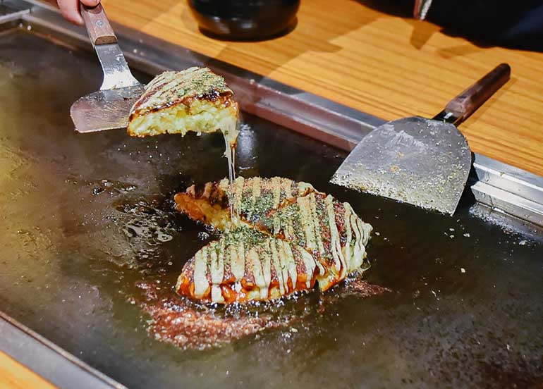 Okonomiyaki on a Griddle at Dohtonbori