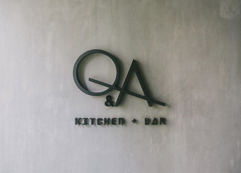 Q & A Kitchen + Bar Logo