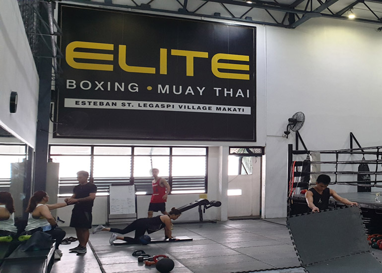 Elite Boxing and Muay Thai Interior with clients and professionals