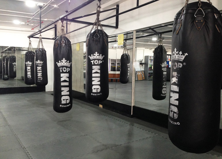 Punching Bags in Gym Interior