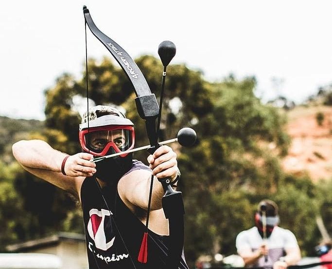 Archery Attack guy focusing shooting archer