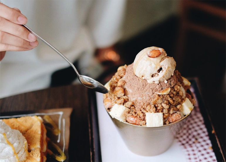 Injeolmi Bingsu with a spoon