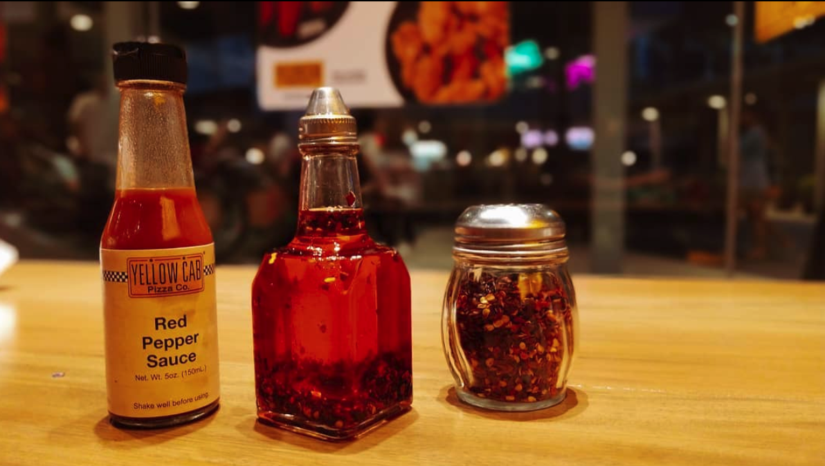 Red Pepper Sauce, Hot Oil, and Hot Pepper Flakes from Yellow Cab