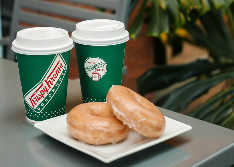 Krispy Kreme Original Glazed Donuts with Coffee cups