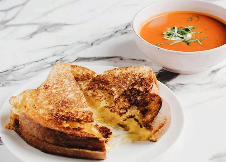 Grilled cheese sandwich with tomato soup from Borough