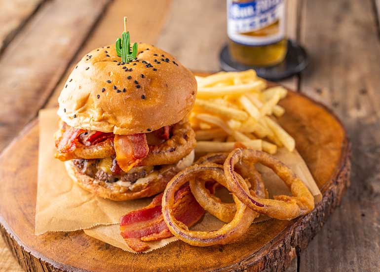 Burgers, Onion Rings, and Fries from Vatos Urban Tacos