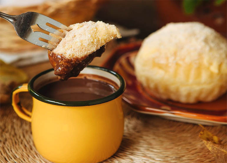 Ensaymada from Mary Grace dipped in hot chocolate