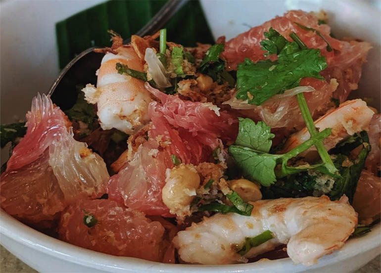 People's Palace Pomelo Salad garnished with cilantro