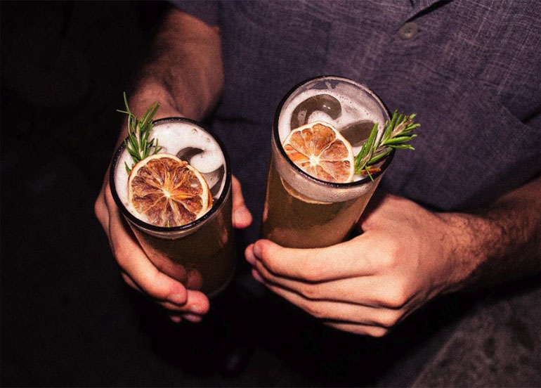 Cocktails with sprigs of rosemary and citrus from Dulo MNL