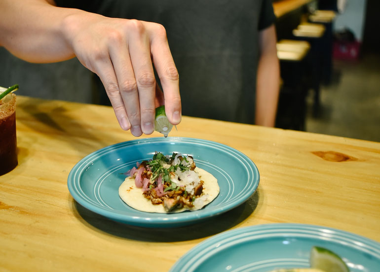 Street Tacos with a lime wedge from LÃ¡grima