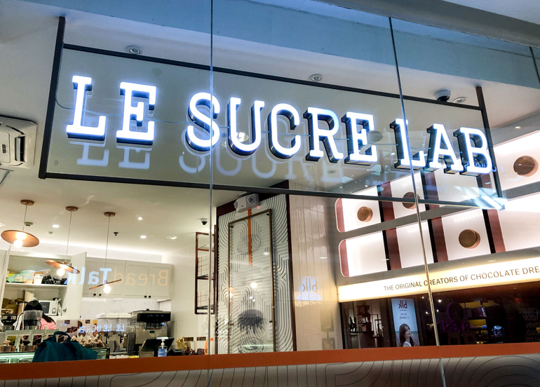 Le Sucre Lab Sign and Interior