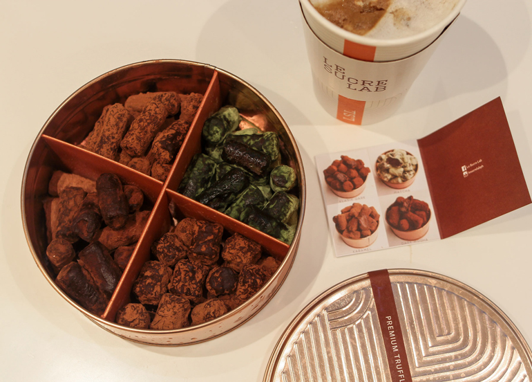 Assorted Premium Truffles and a Hot Drink from Le Sucre Lab