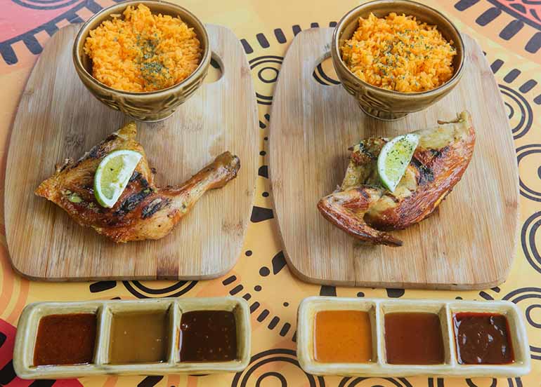 Quarter Chicken with Rice and Sauces from Peri-Peri Charcoal Chicken