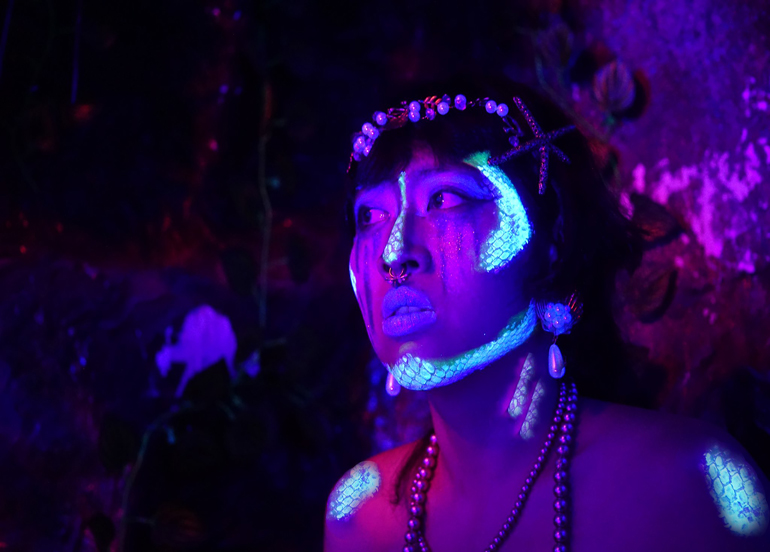 Tipsy Tales Folklore Character under Black Light