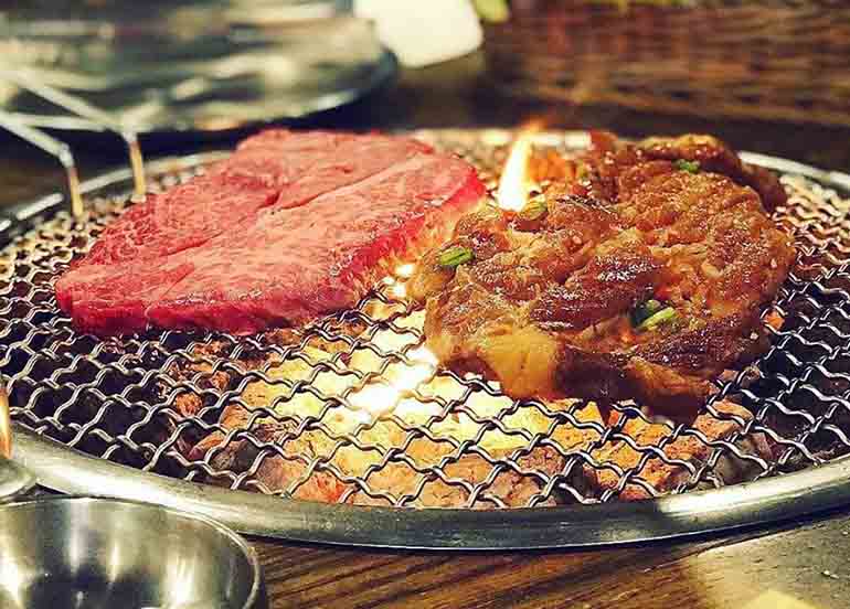 Grilling Meat from 678 Korean BBQ Restaurant