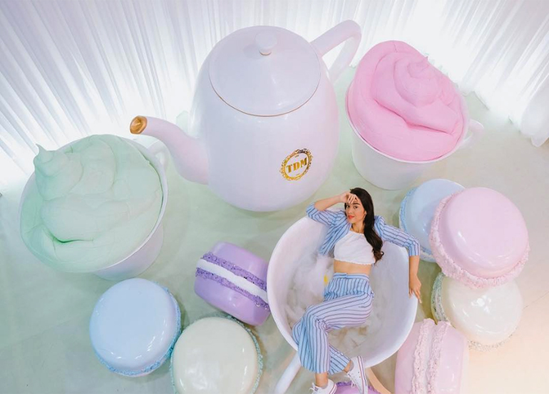 Macaron Tea Party room with giant teapots and macarons