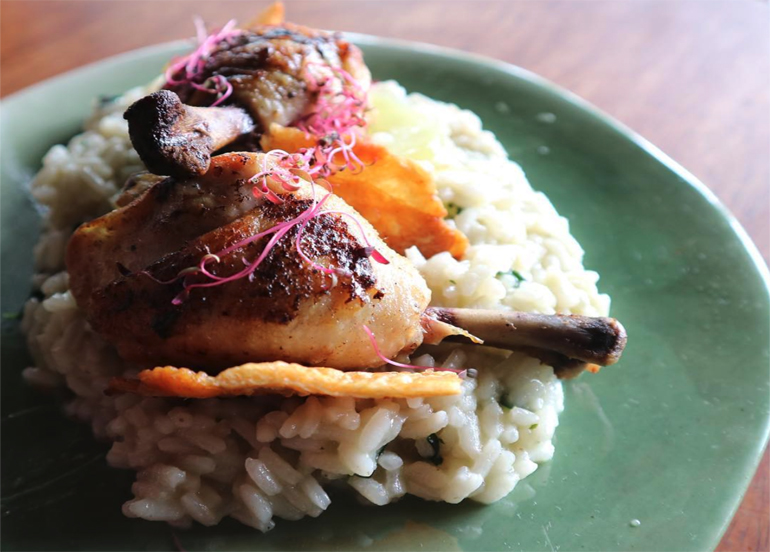 Chicken dish from Tahanan Bistro topped with risotto