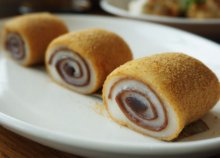 Glutinous Rice Roll with Red Bean Paste topped with Grated Nuts from Paradise Dynasty
