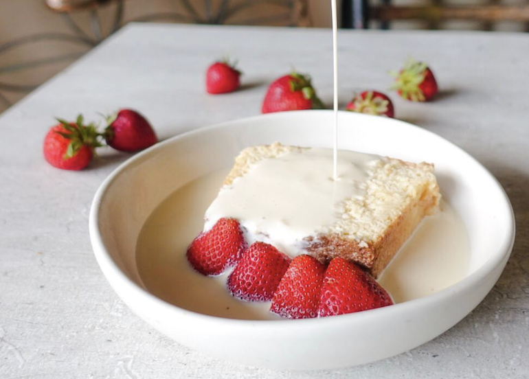 Grace Park dessert topped with leche and strawberries