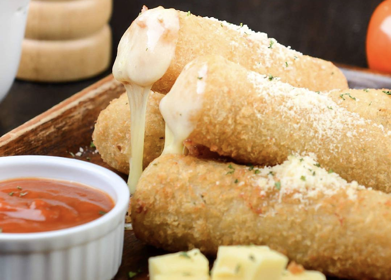 Miguel & Maria Mozzarella Cheese Sticks with a side of marinara sauce 