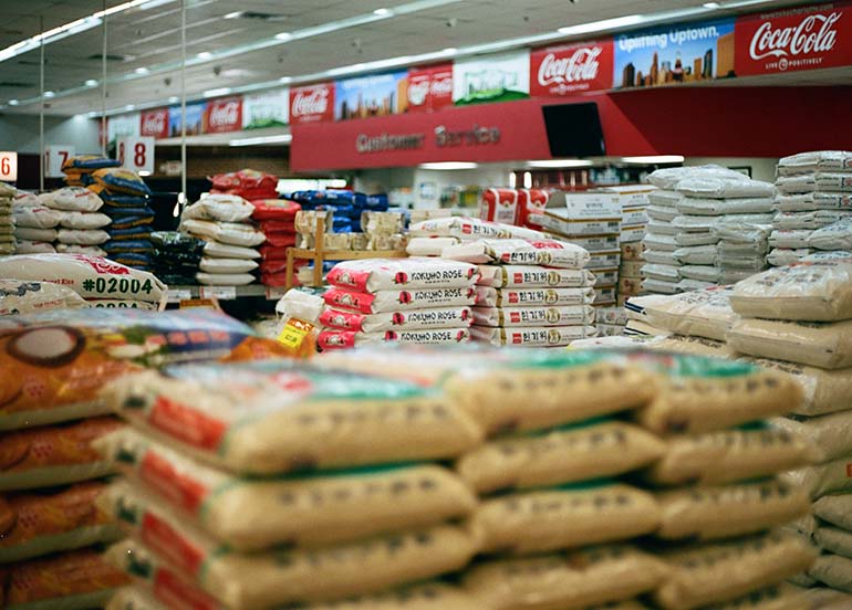 sacks-of-rice-at-grocery-store