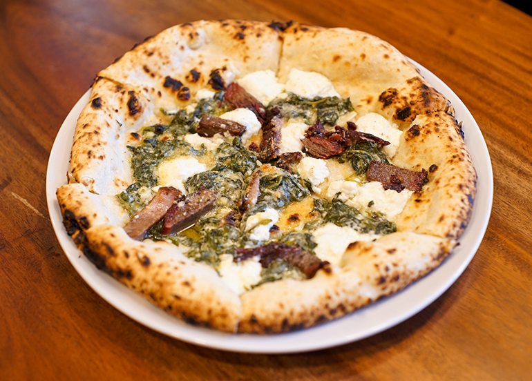 gino's brick oven pizza smoked beef spinach pizza